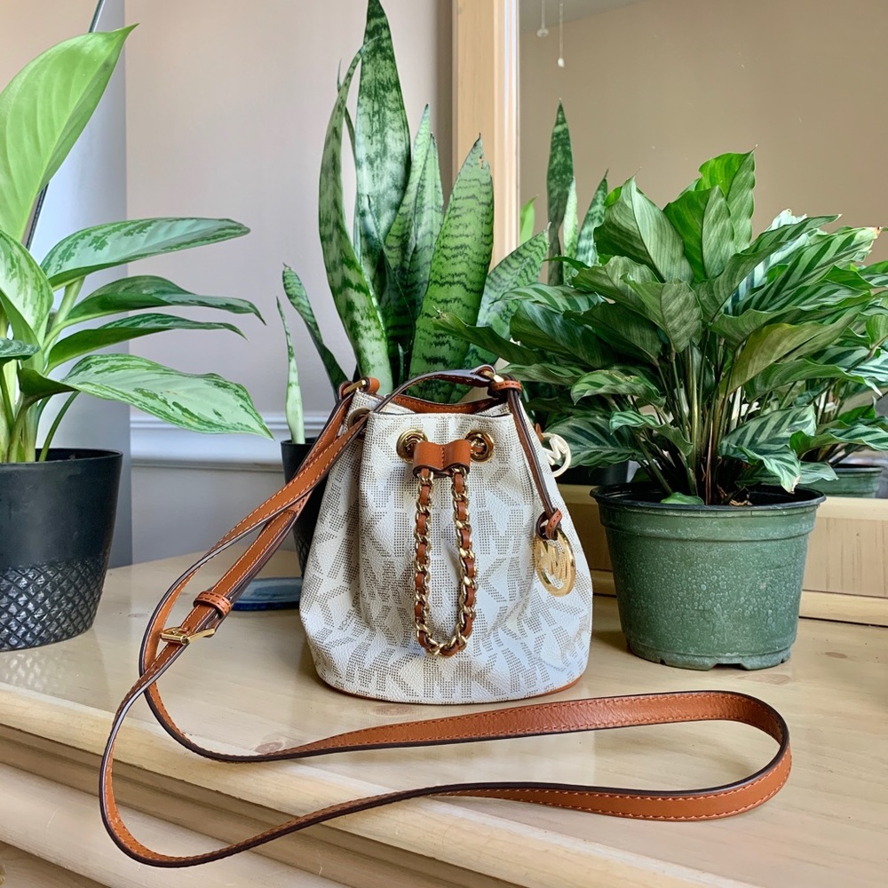 Authentic Michael Kors Drawstring Cross-body bag